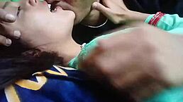 kissing girlfriend's big tits