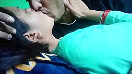 kissing girlfriend's big tits