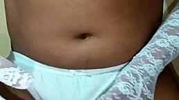 Thai ladyboy shemale flaunts erotic white panties and matching bra.