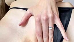 a lactating milf experiences an orgasm with a dildo, spraying breastmilk in this softcore scene