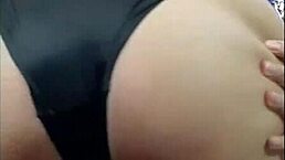 Undressing Doña Mary in her room when her husband leaves.