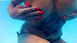 Melissa With Brown Eyes And Tattoo Plays As A Mermaid In The Pool