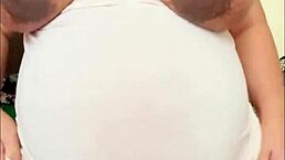 Pregnant Arab girl flaunts big belly and milky boobs