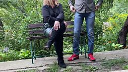 mature milf in sexy heels and clothes assists man with outdoor relief