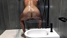 Stepmother watches stepson in shower, moaning loudly