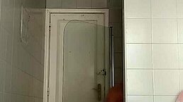 Why is this hot guy drinking while shaving his massive cock?