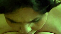 A couple at home, she with short hair and piercing, gives a deepthroat blowjob until he cums in her mouth.