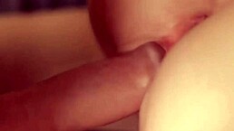 The petite girl's shaved pussy gets pounded by a fat cock until she orgasms.