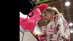 Hot granny in store spying upskirt skirt?