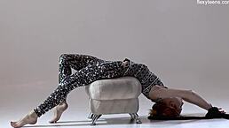 russian gymnast rita mochalkina spreads legs in yoga pose