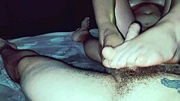 I give erotic massage with my feet jerking cock