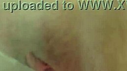 Watch this natural busty redhead masturbate with her clear dildo up close?