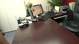 in bed, licking the brunette secretary's pussy while wearing fishnets.