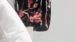 Skinny young brunette in sexy one piece swimsuit shows off legs and small waist