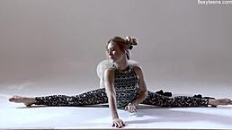 russian gymnast rita mochalkina spreads legs in yoga pose