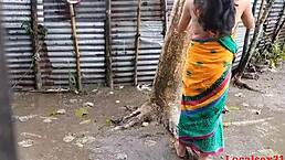 Bengali boudi has outdoor sex with friend during rain?