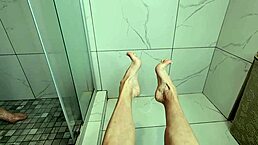 sexy young milf teases cock with feet and toes in bath