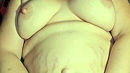 She's playing with her pussy and cumming hard