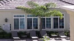 Blonde sweet mom relaxes in bed alone