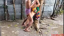 Bengali boudi has outdoor sex with friend during rain?