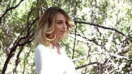 Does the stunning blonde get naked in the forest?