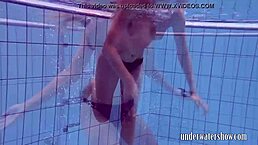 Lucy removes bikini during pool bath