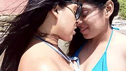 Lesbians in wet bathing suits scissoring outdoors before gaping pussies fucked by strangers big cock in FFM threesome