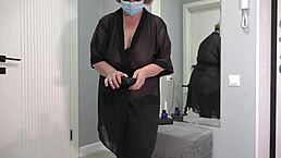 a plump milf with big butt, saggy tits, and hairy beaver tries on new sexy bodysuit in front of mirror