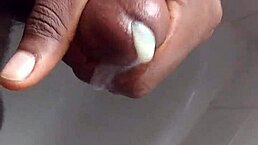 he takes a shower and shows off his big black cock in solo usa amateur session