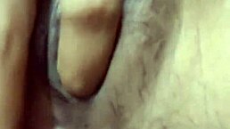 Indonesian beauty with tight swollen pussy lips fingers her big asian cunt in close-up pov.