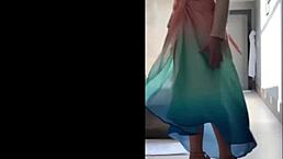 This mature Brazilian milf dances sensually outdoors in her short skirt and panties showing off big ass and small tits