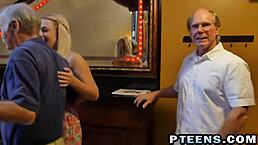 Experienced blonde teen 18+ enjoys two dongs in group action with blowjob and doggystyle. She bends over for oral fun.