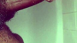 he takes a shower and shows off his big black cock in solo usa amateur session