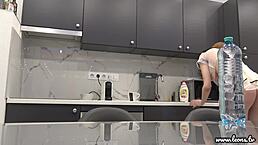 Hot tight pussy tall latvian redhead lilly shows off her ass and tits in kitchen with see through miniskirt