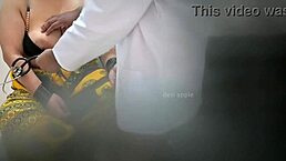 Indian doctor engages in intense session with patient at hospital alongside nurse