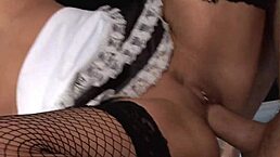 Milf Emma Butt gives a double blowjob to two cocks in her mouth.