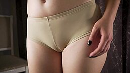 Camel toe tease unfolds in vintage panties with close-up belly and pussy lips