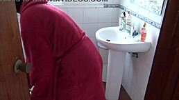 perverted stepmother shows hairy pussy close-up while pissing in front of stepson