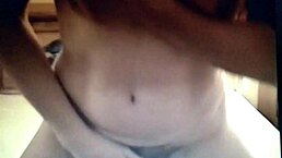 I'm just masturbating on the bed with my brunette hair down