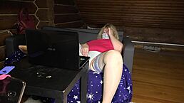 A blonde mature housewife teases her friend in sex chat, showing chubby figure, legs in stockings, big ass under skirt, and panties for homemade fetish fun.