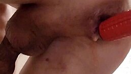 Casually, my natural anal lubricant leaked from prolapse again while squirming from intense anal stretching with toys and fisting.