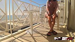 oh wow this hidden cam caught my sexy wife reaching wild orgasm masturbating on the hotel balcony near the busy beach crowd