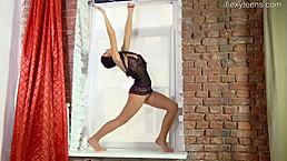 Sexy brunette teen Tonya Bellucci spreading her flexible gymnast legs wide open?