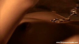 Sexy asian woman revealing her body in a hot dance.