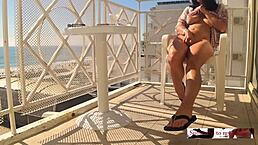 oh wow this hidden cam caught my sexy wife reaching wild orgasm masturbating on the hotel balcony near the busy beach crowd
