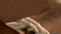 bound ebony slave gets anal hooked and spanked in lezdom bondage