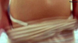 Who's that hot milf next door teasing with her housewife charm?