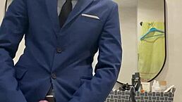 Hot daddy is jerking off and busts a thick load in this outdoor public toilet scene.