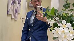 Hot daddy is jerking off and busts a thick load in this outdoor public toilet scene.