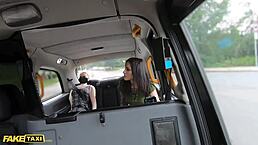 Fake taxi sex doll watches as cabbie cheats with tattooed brunette babe Natasha Ink in backseat pounding.